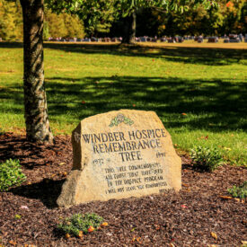 Windber Hospice Rememberance Tree stone with quote "This tree commemorates all those that have died in the hospice program. I will not leave you comfortless. John 14:18"